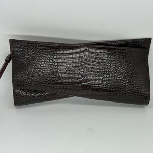 Christian Louboutin LOUBITWIST Twisted Crock
Leather Clutch Wrist Mini Bag